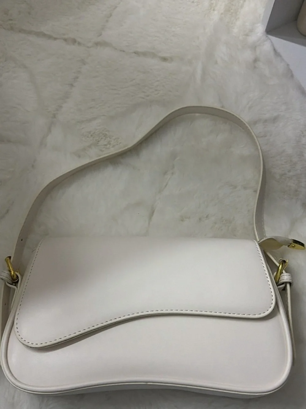 Elegant Cream Curved-Flap Shoulder Bag